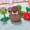 kf Sf415837b1c594490a3b1d023177e5455v Plants VS Zombies Blocks Small Cartoon Mini Building Block Peashooter SunFlower Chomper Assemble Action Model Doll - Plants vs Zombies Shop